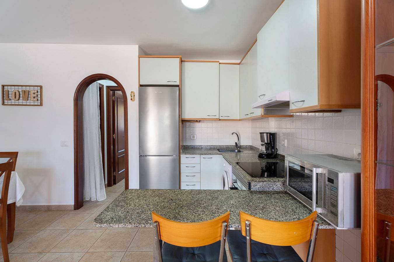 Foto 10 von 33: Ferienwohnung 'Apartamento Los Geranios' mit Gemeinschaftspool, privater Terrasse und WLAN