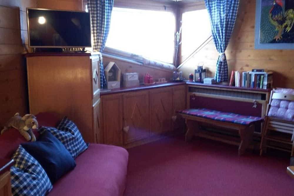 Foto 9 von 24: Wohnung mit Zwischengeschoss und Kamin