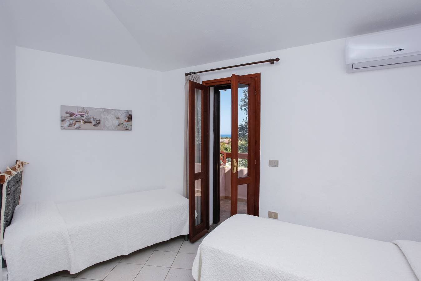 Foto 13 von 21: Ferienhaus „mirtagru casa Della Sughereta“ mit Meerblick, Terrasse und WLAN