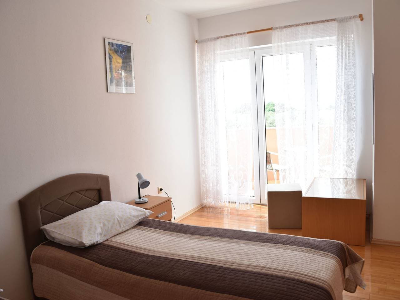 Foto 11 von 27: Ruhiges Ferienhaus mit Balkon und Garten