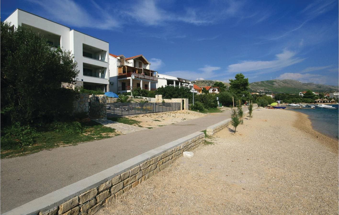Foto 4 von 35: Gemütliche Ferienwohnung mit Meerblick, Terrasse, WLAN und Zugang zum Strand