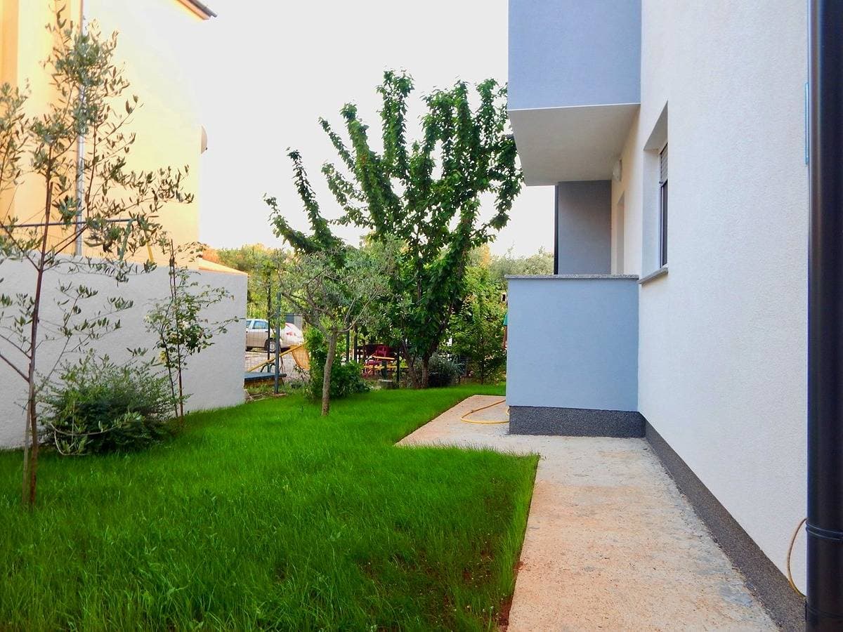 Foto 11 von 14: Comfortable lovely apartment with patio and grill / A2