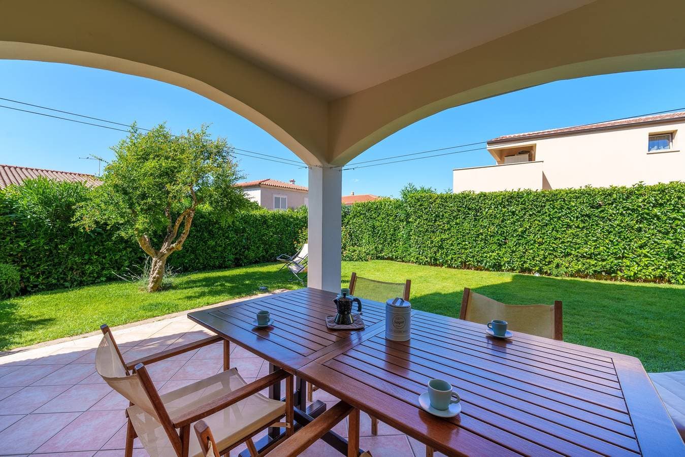 Foto 4 von 20: Ferienwohnung 'Casa Vacanze Mandorlo' mit Gemeinschaftspool, Terrasse und Garten