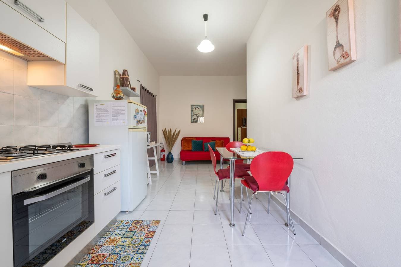 Foto 9 von 28: Ferienwohnung 'Gerani Rossi' mit Gemeinschaftsgarten, Wi-Fi und Klimaanlage