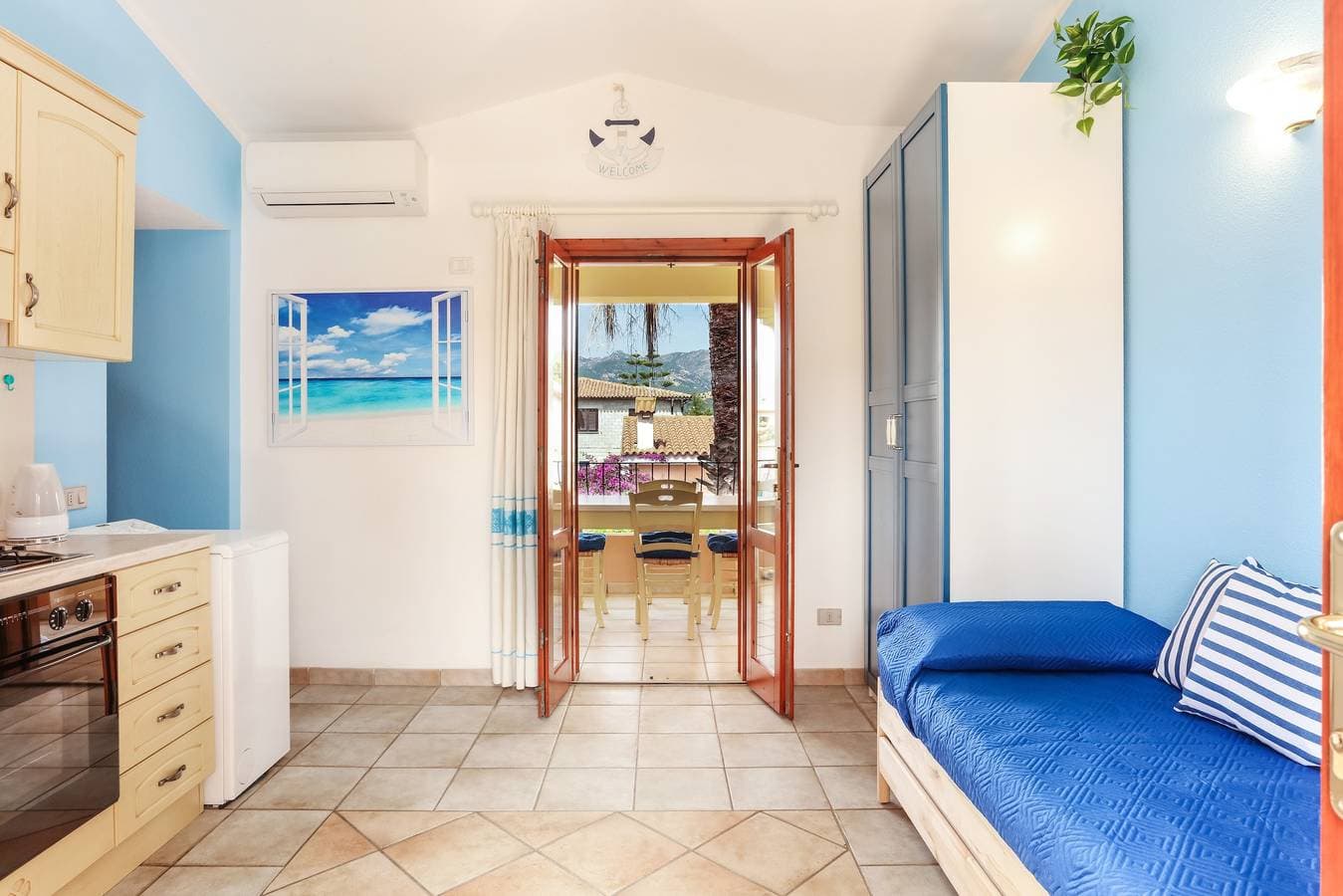 Foto 6 von 26: Ferienwohnung "Bilocale Geranium Beach" mit Terrasse und Klimaanlage