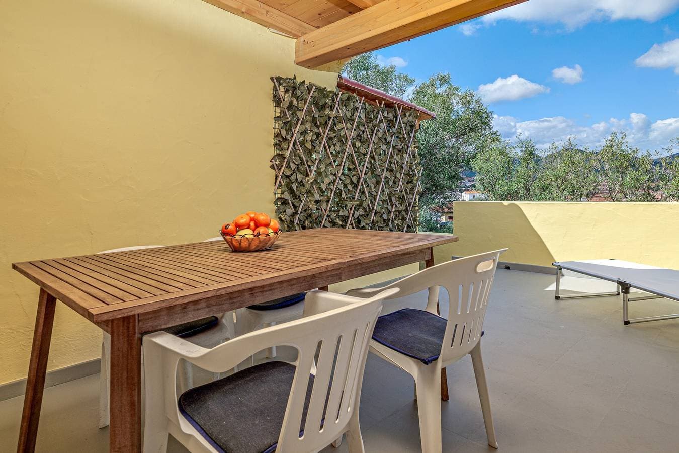 Foto 4 von 20: Ferienhaus 'I Giardini Di Cala D'ambra' mit gemeinsamer Terrasse und Klimaanlage