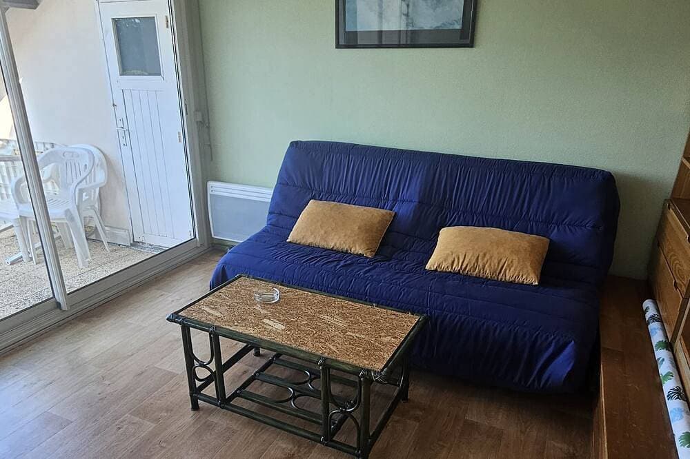 Foto 10 von 28: Apartment with beautiful view over a wooded park and a large terrace