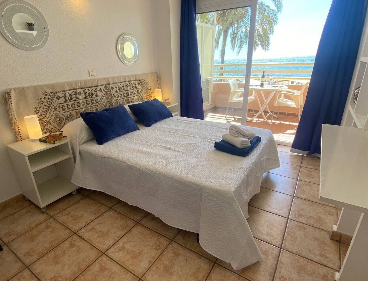 Foto 7 von 19: Ferienwohnung 'Terraza De Ensueño En La Playa' mit Meerblick, Gemeinschaftspool und A/C