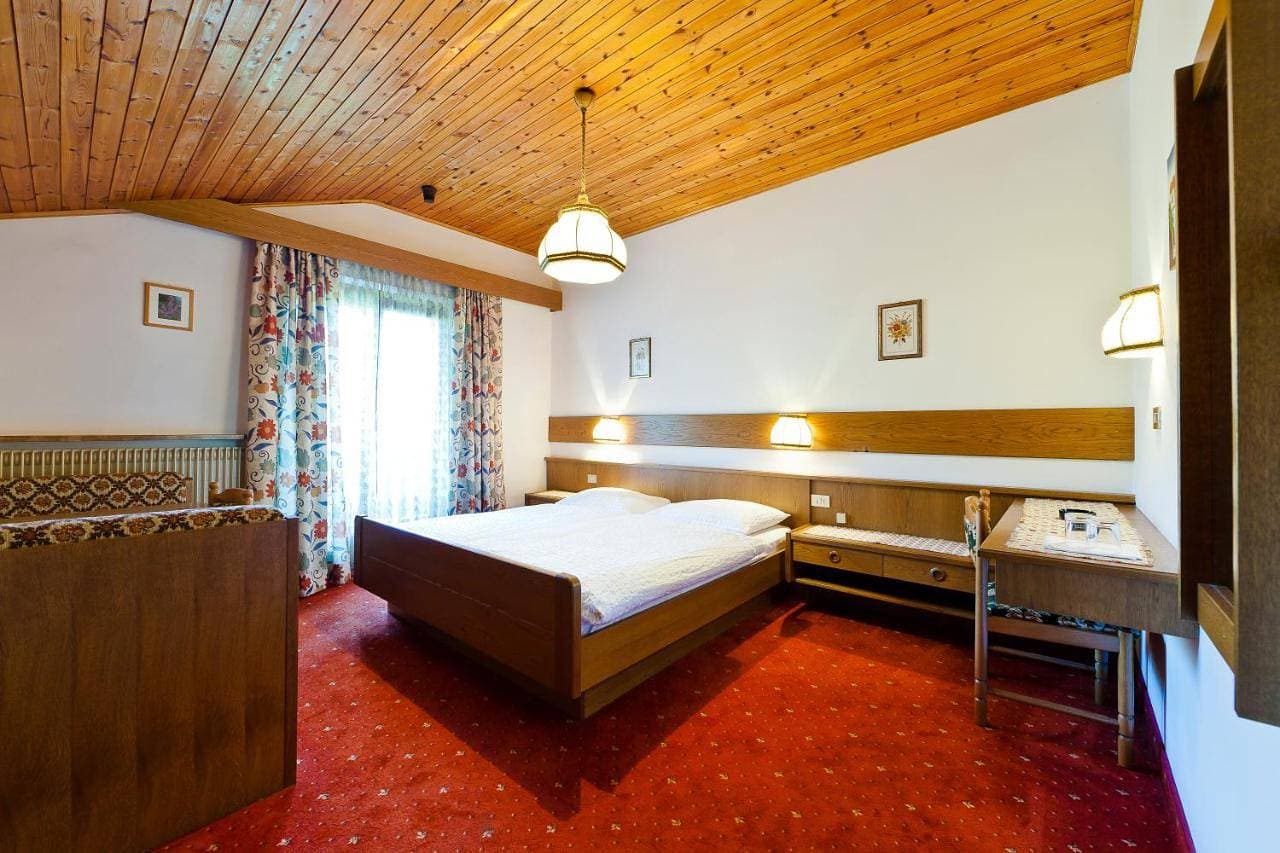 Foto 6 von 9: Quadruple Room