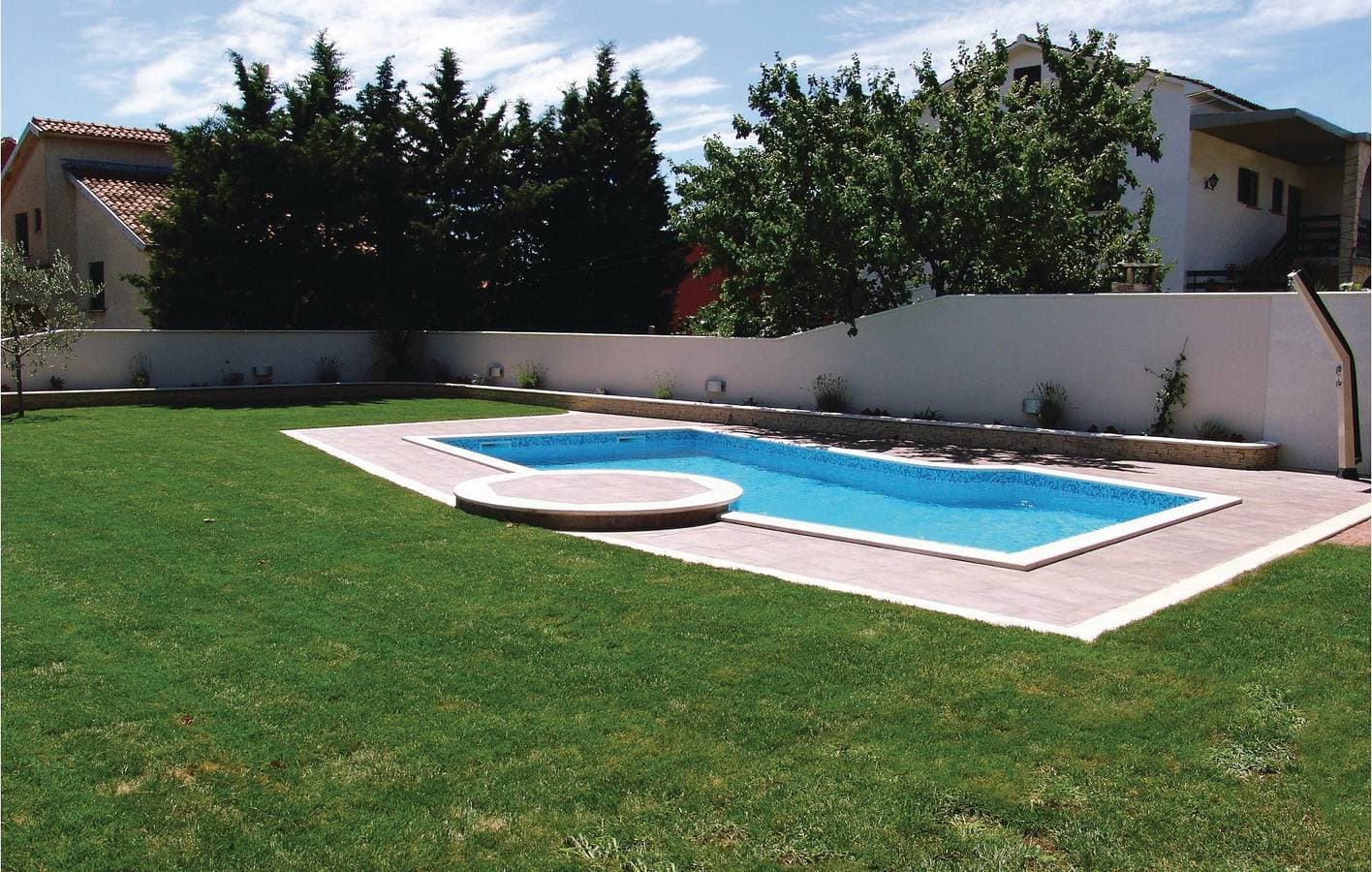 Foto 6 von 25: Apartment mit Meerblick, Pool, Terrasse und Parkplatz – 700 m vom Strand entfernt