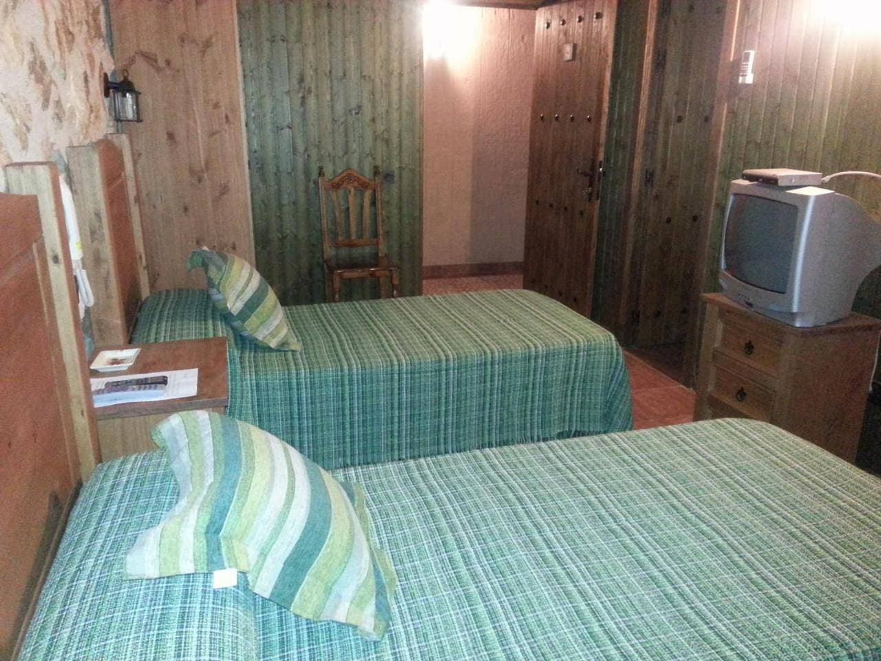 Foto 10 von 27: Quadruple Room