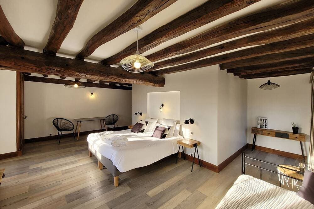 Foto 3 von 30: Dreibettzimmer-Deluxe-Ensuite-Gartenblick-Avec Sauna