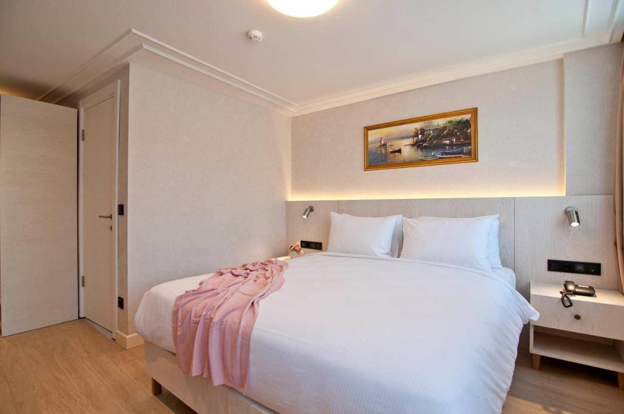 Foto 9 von 27: Deluxe Double Room with Side Sea View