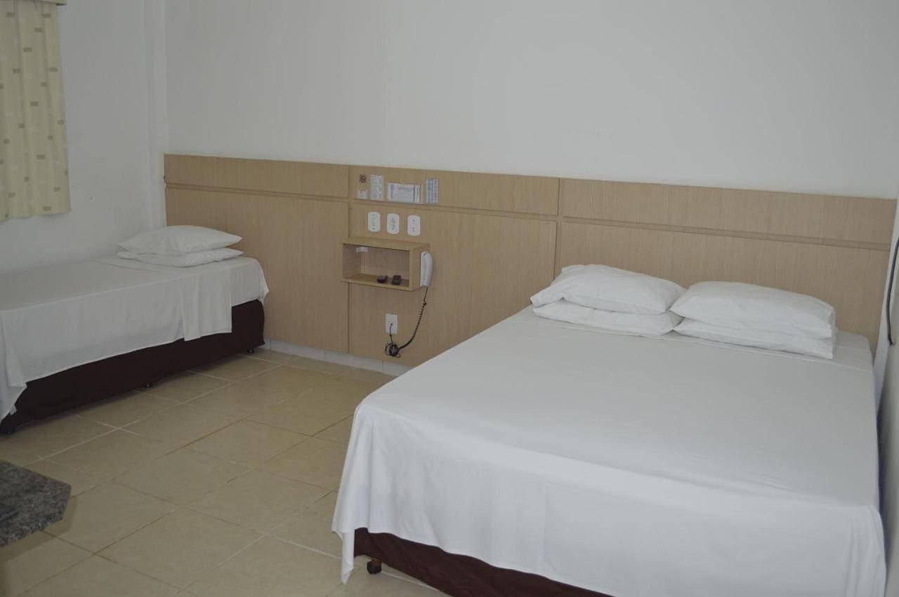 Foto 11 von 14: Triple Room with One Double Bed and One Single Bed