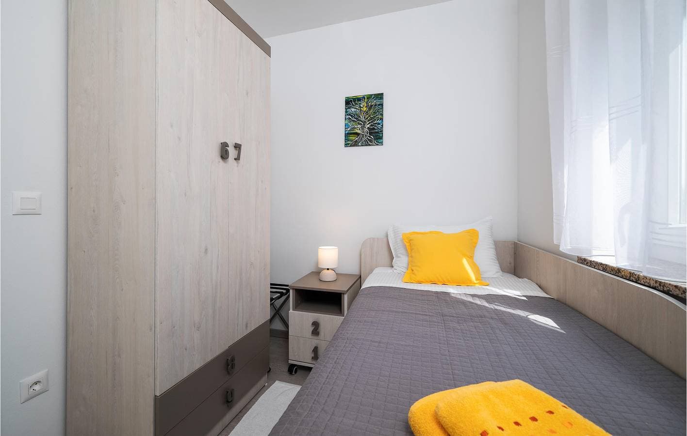 Foto 12 von 20: Moderne 66 m² große Wohnung mit Terrasse, WLAN, Klimaanlage und Parkplatz