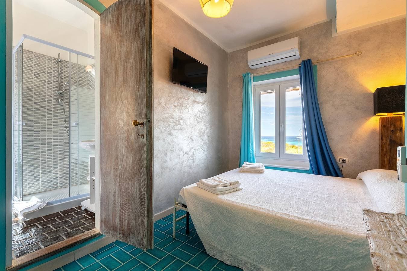 Foto 11 von 37: Ferienhaus 'Asinara' mit Meerblick, WLAN und Klimaanlage