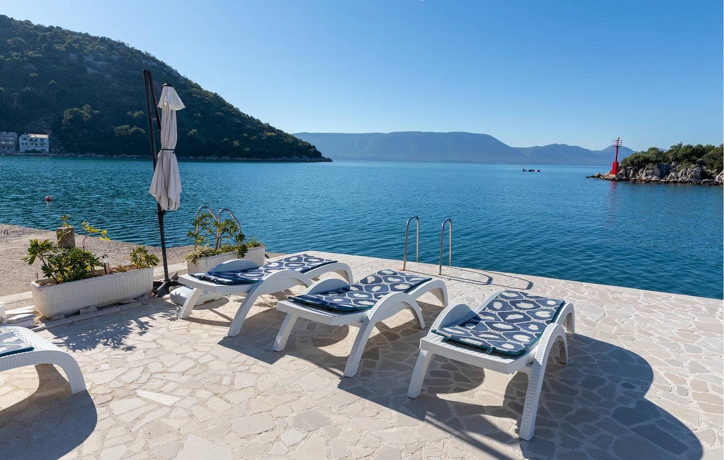Foto 4 von 38: Gemütliche 300 m zum Strand: Klimatisierte Wohnung mit Terrasse und Parkplatz