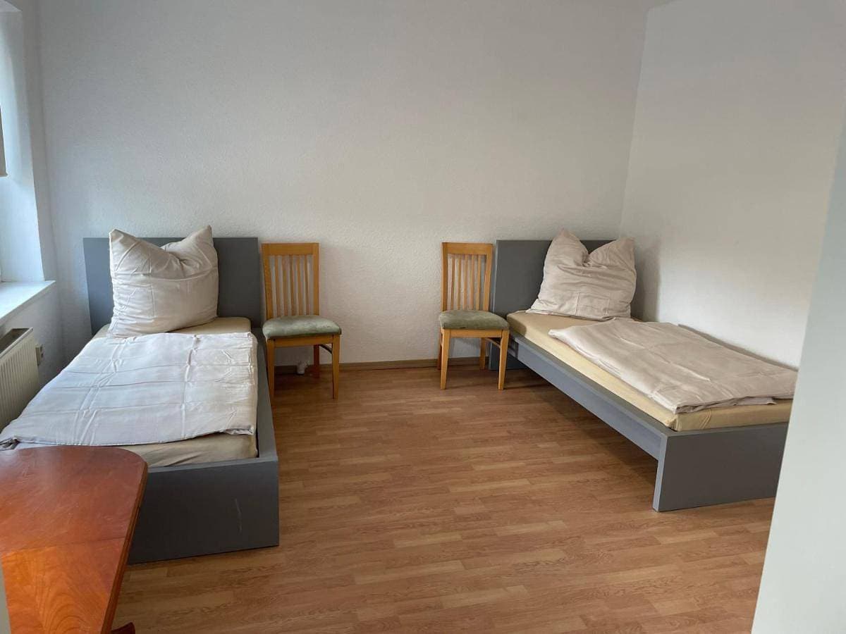 Foto 10 von 25: Triple Room with Private Bathroom