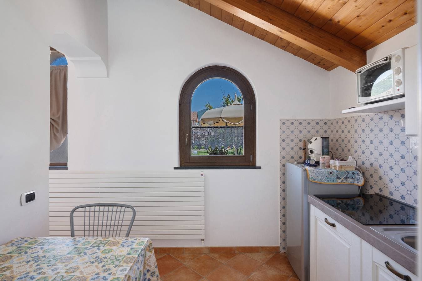 Foto 5 von 21: Ferienwohnung 'Delizioso Chalet Con Ampio Giardino' mit Bergblick, Wi-Fi und Klimaanlage