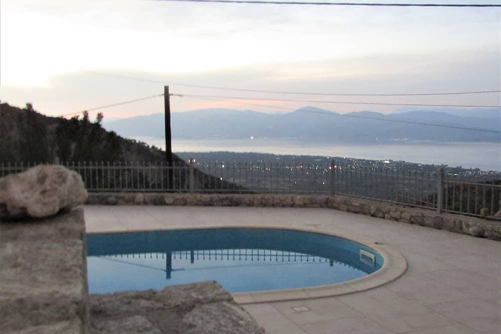 Stone house with pool and view to the sea 1
