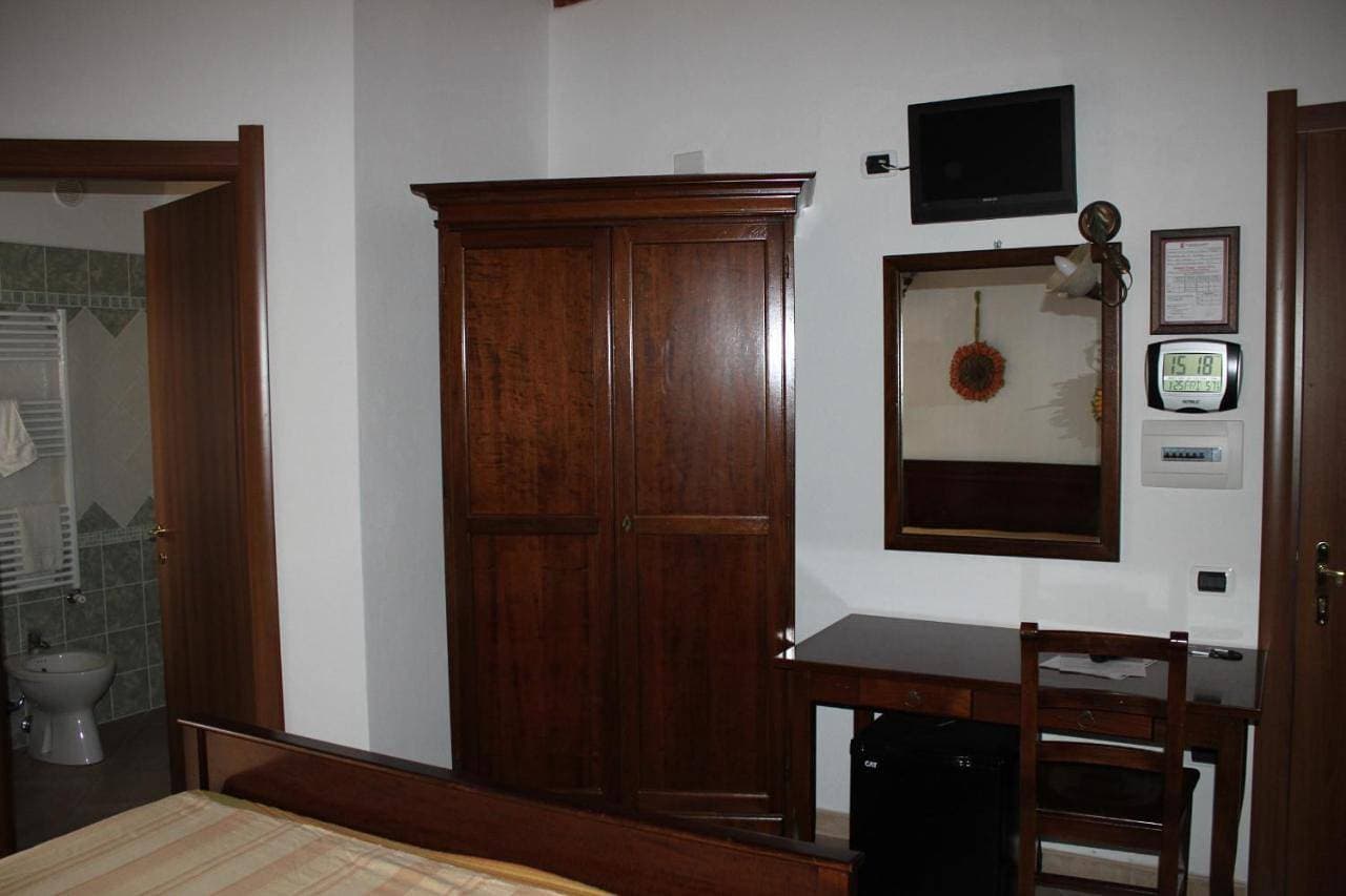 Foto 8 von 18: Quadruple Room