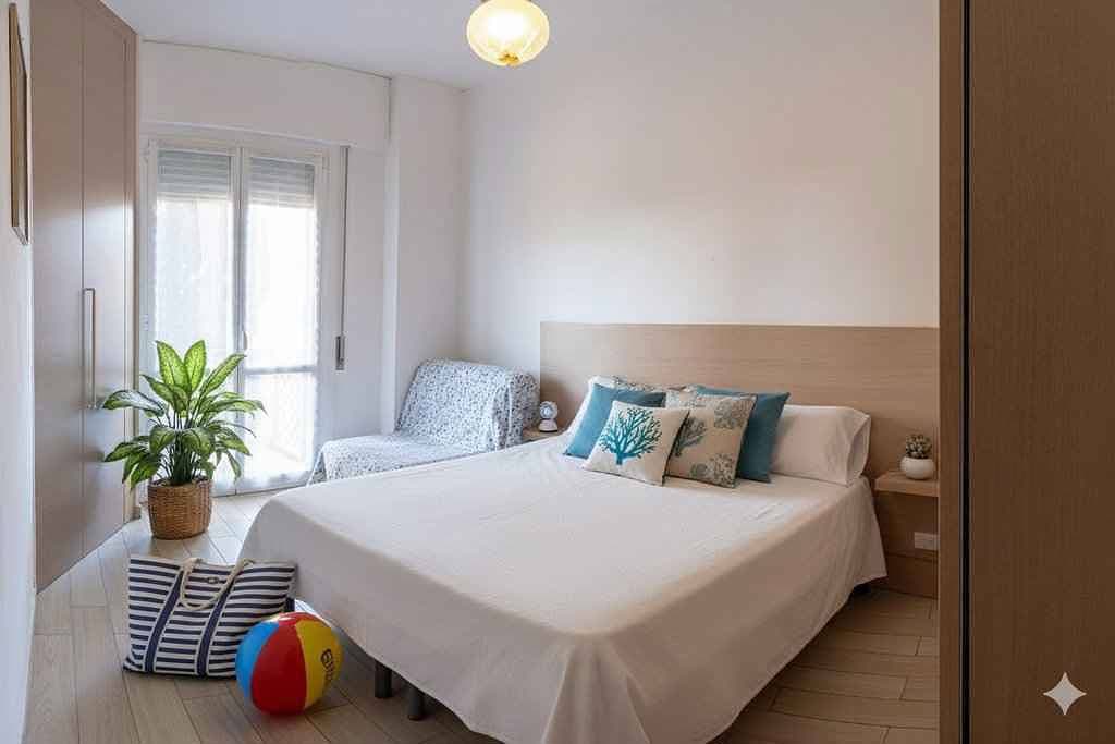 Foto 5 von 10: Ferienwohnung mit Klimaanlage und Balkon mit Meerblick
