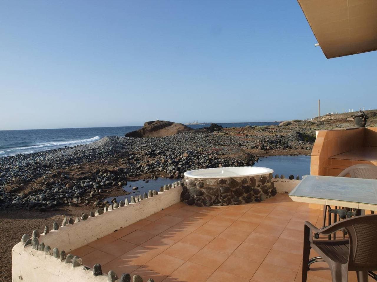 Foto 4 von 40: Ferienhaus 'Sunrise Direkt am Meer' mit Meerblick, Privater Terrasse und WLAN