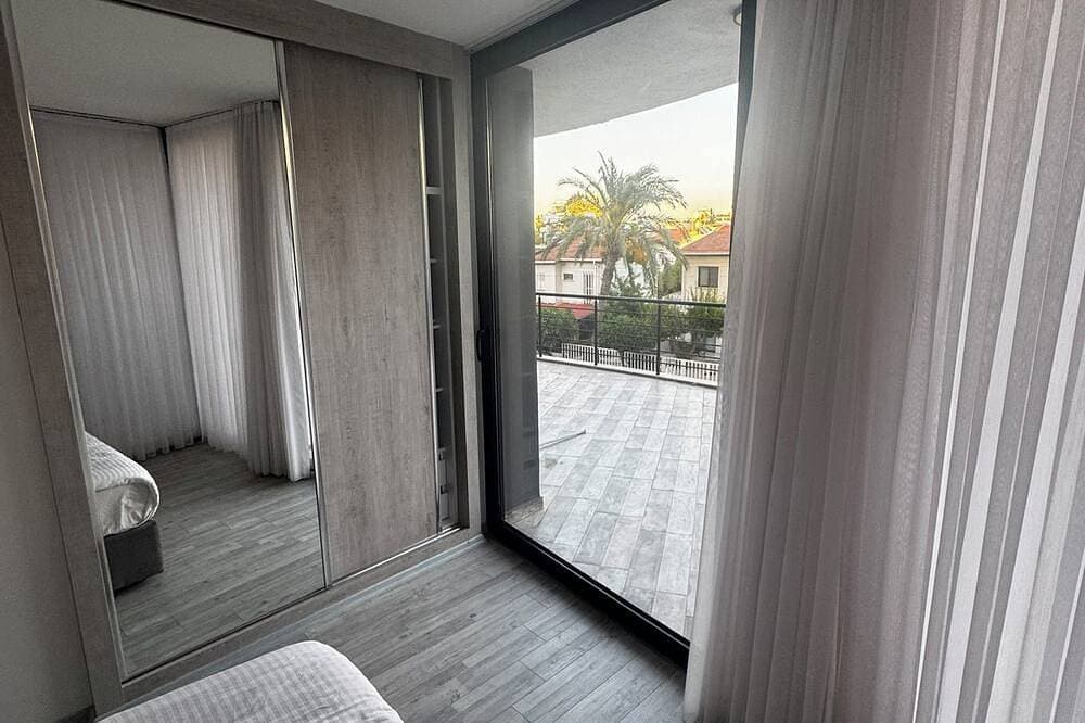 Foto 6 von 21: Girne- Geniş Teraslı Modern 2+1 Daire