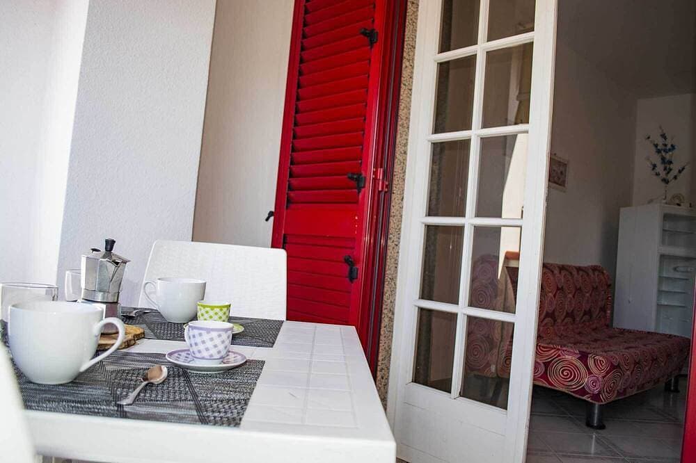 Foto 10 von 24: Hübsche Zwei-Zimmer-Wohnung mit möblierter Terrasse