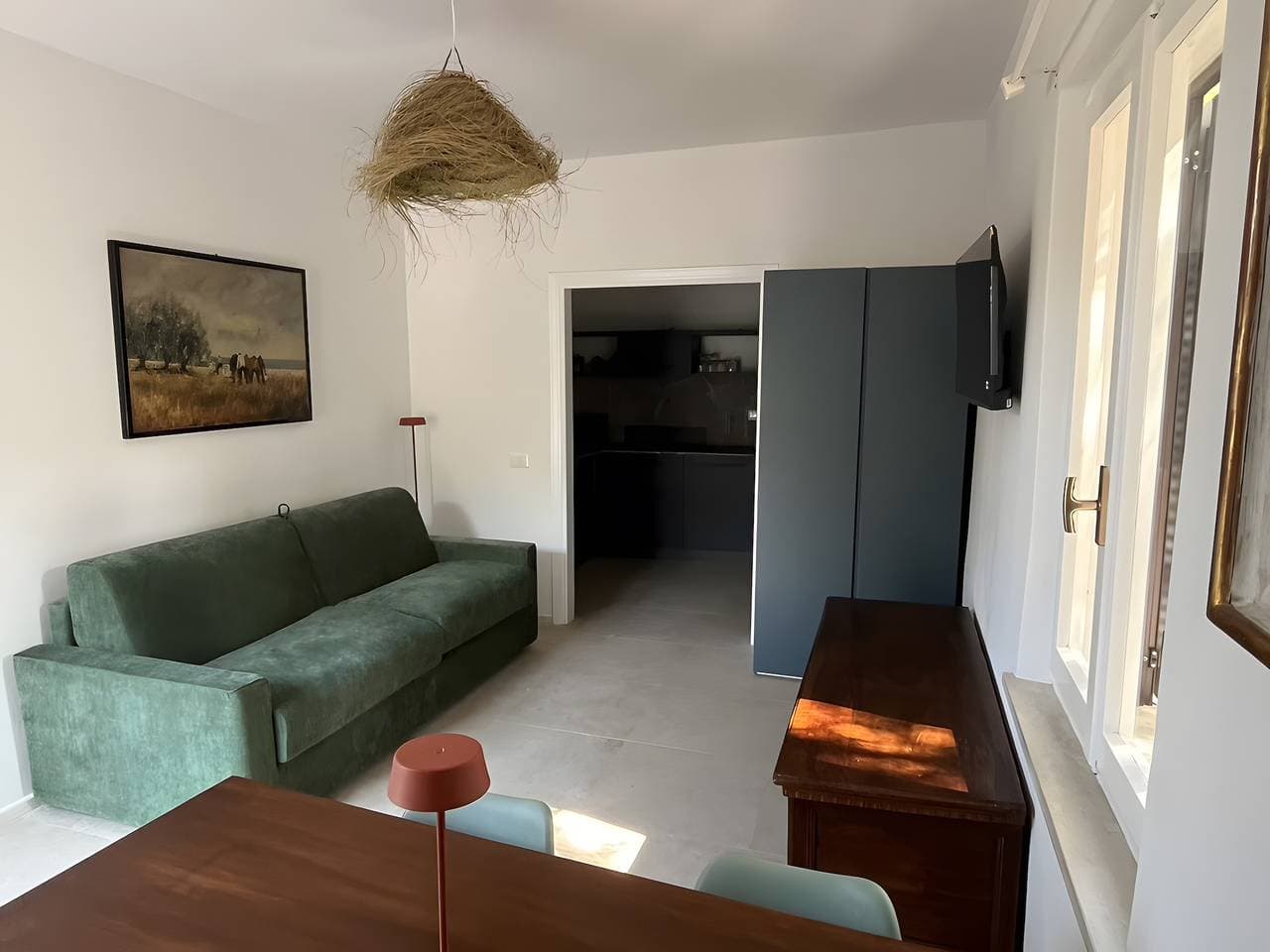 Foto 2 von 33: Apartment 'Il Casalino - Bilo 4' mit Bergblick, Gemeinschaftsgarten und Klimaanlage