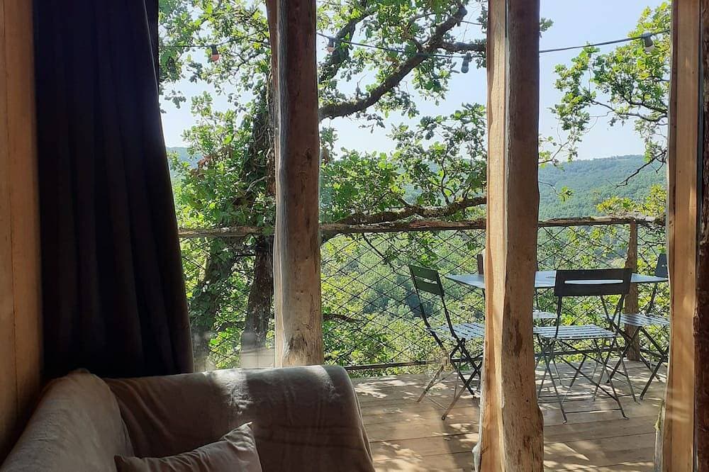 Foto 12 von 24: Wooden tree house