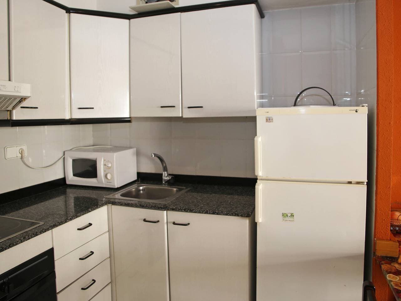 Foto 11 von 22: Wohnung mit 2 Pools und Gemeinschaftsgarten