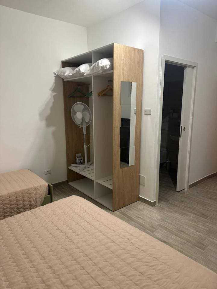 Foto 6 von 13: Triple Room with Private Bathroom