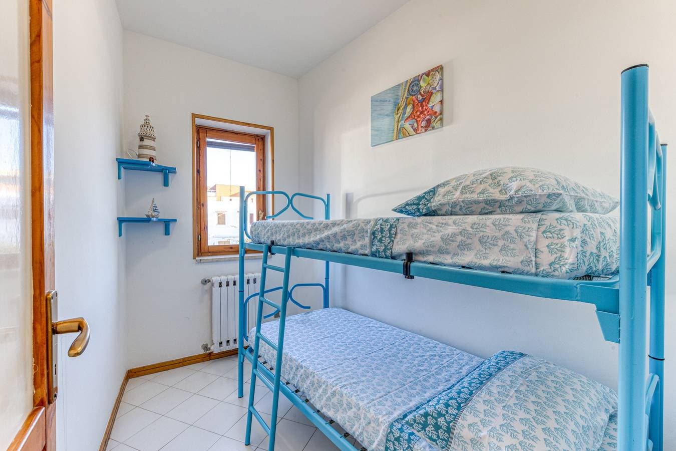 Foto 5 von 19: Ferienhaus 'Casa A Lido Marini' mit Balkon und Klimaanlage