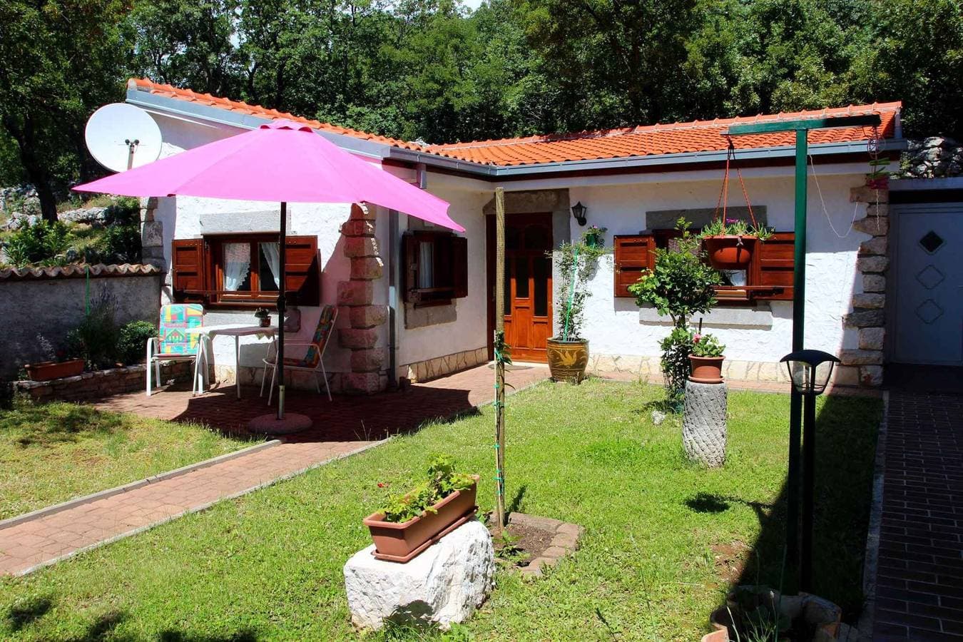 Foto 3 von 25: Ferienhaus mit Garten