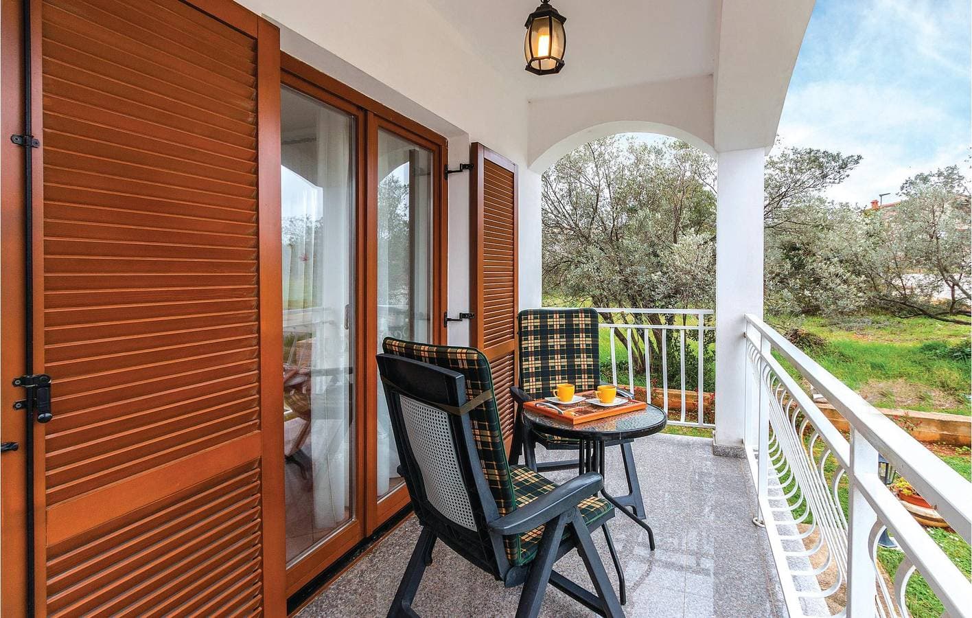 Foto 4 von 18: Gemütliche Ferienwohnung mit Terrasse, Parkplatz und WLAN in der Nähe des Caffè Bar Porto
