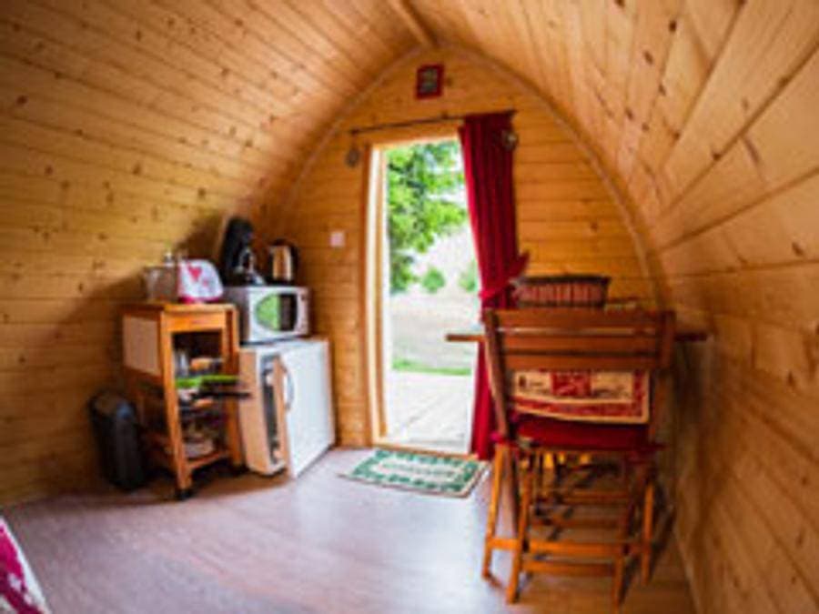 Foto 9 von 17: Camping Les Tilleuls - Tiny house 2 personen - Iris-Hütte