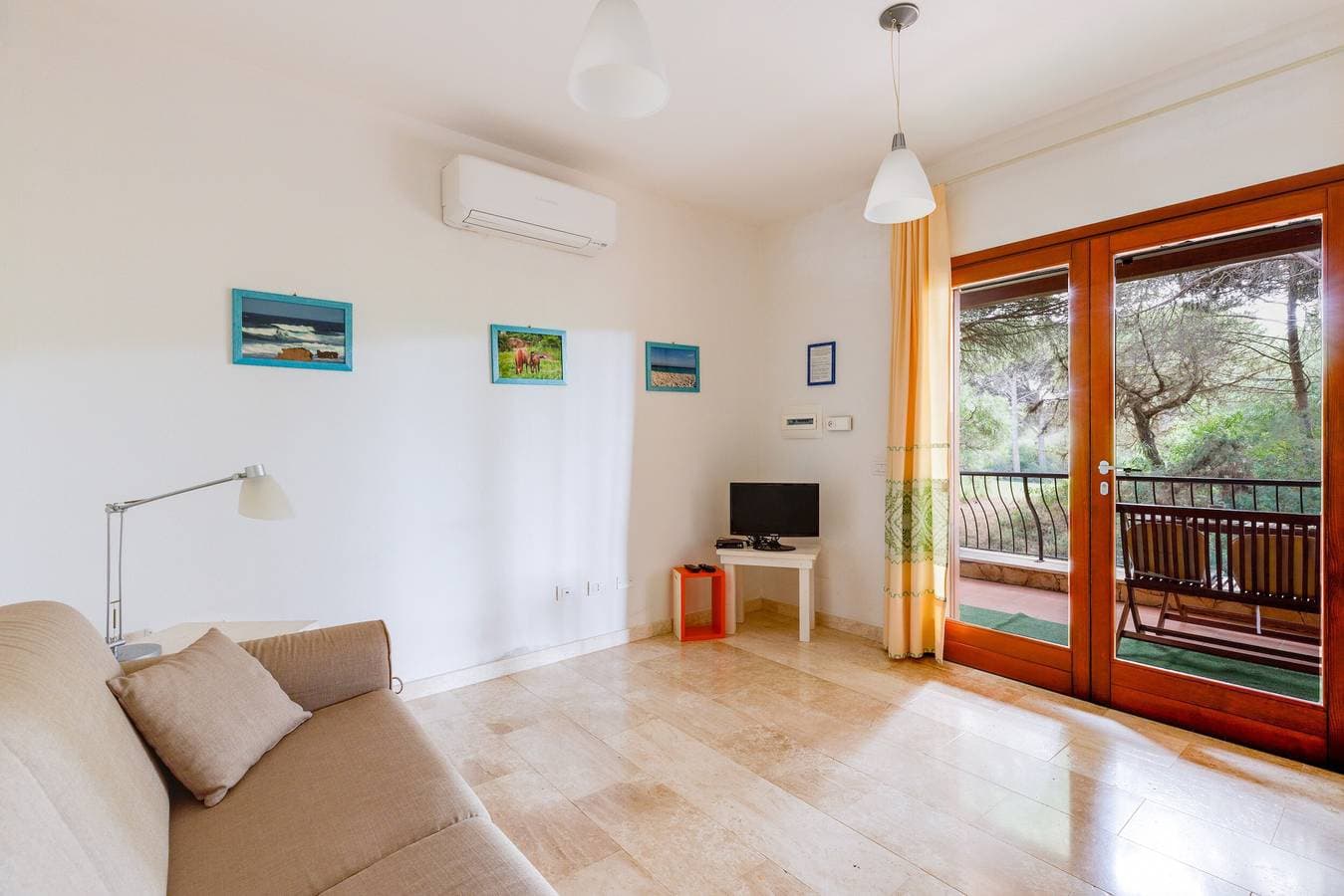 Foto 4 von 26: Ferienhaus "Antonella Sul Golf" mit Gemeinschaftspool, privater Terrasse und WLAN