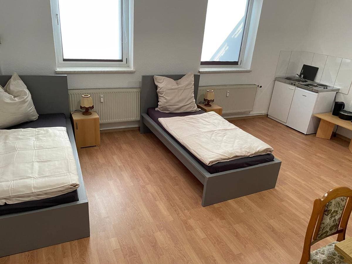 Foto 13 von 25: Triple Room with Private Bathroom