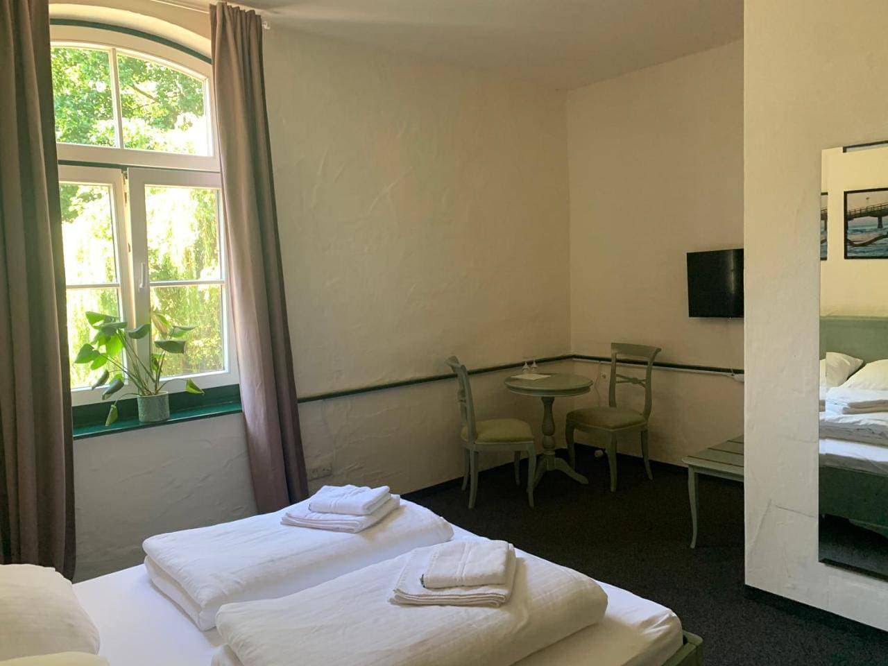 Foto 13 von 16: Double Room with Private Bathroom