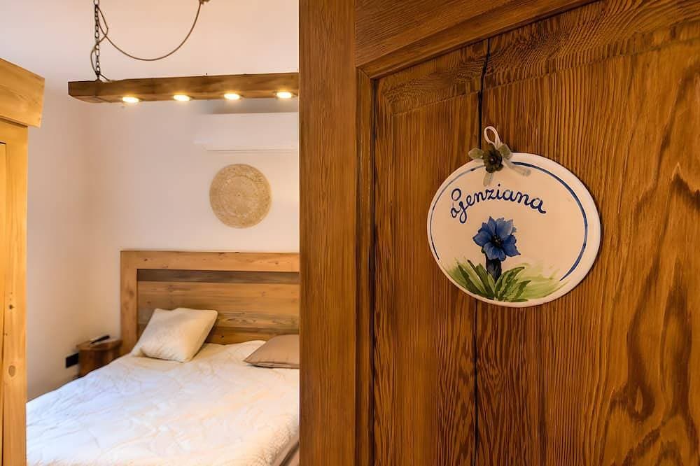 Foto 3 von 21: Zimmer „Camera Genziana“ mit Bergblick, WLAN und Klimaanlage