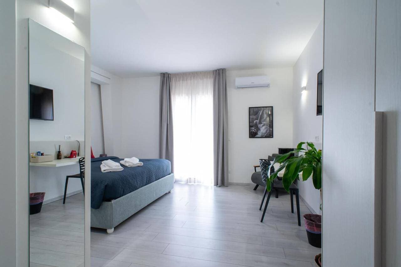 Foto 2 von 8: Double Room with Private Bathroom