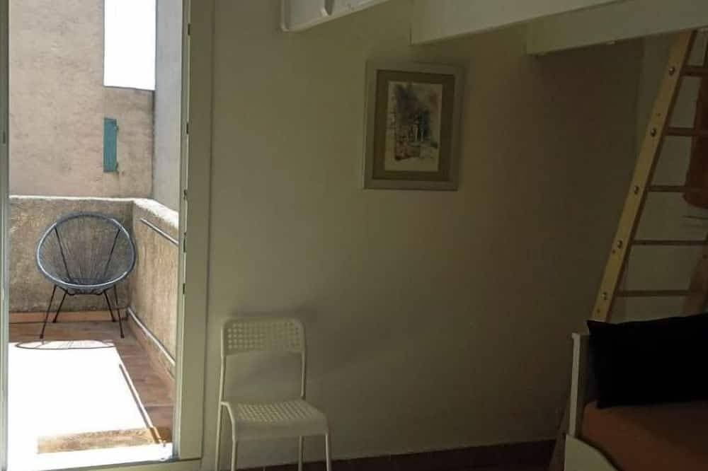 Foto 6 von 12: Joli Studio Avec Mezzanine
