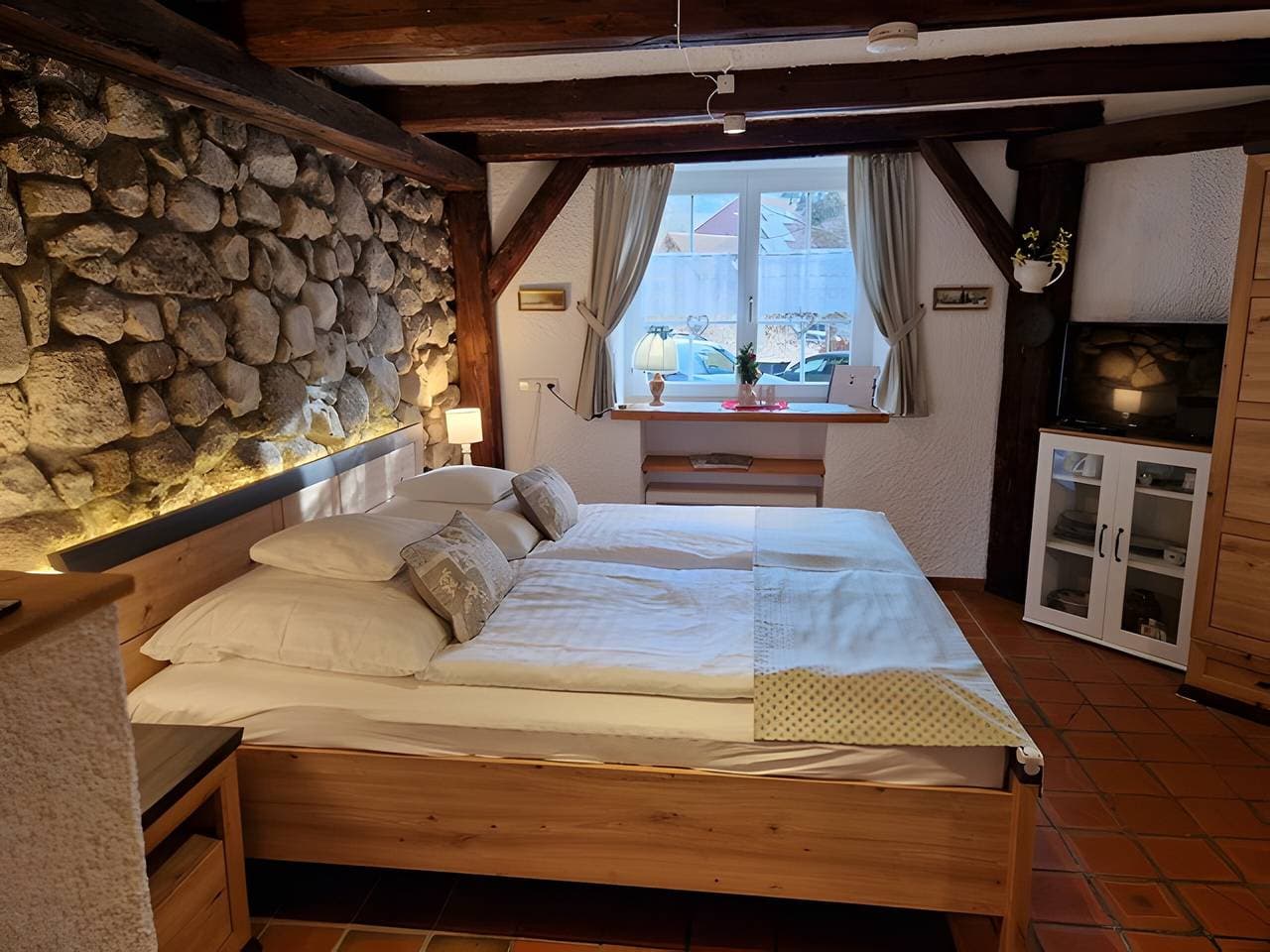 Foto 4 von 25: Einzimmerapartment 'Zehntstüble' mit Gemeinschaftsgarten und WLAN