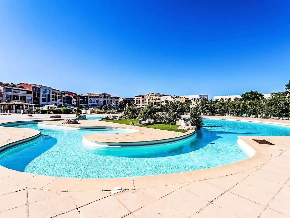 Foto 3 von 19: T2 klimatisiertes Apartment mit Pool und Strandzugang