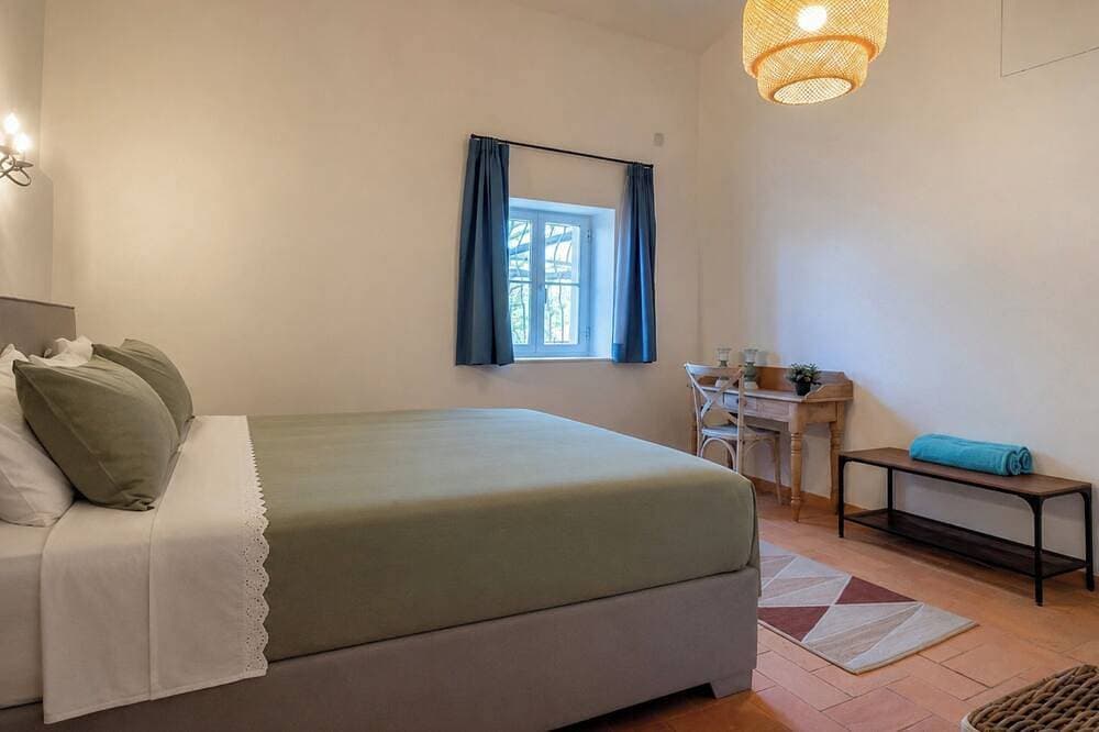 Foto 4 von 30: Ferienhaus mit großer Terrasse und großem Pool