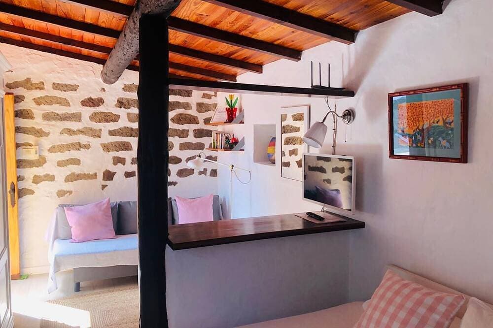 Foto 7 von 21: Cabaña en zona tranquila con bonitas vistas, acogedor estilo y cuidado jardín.