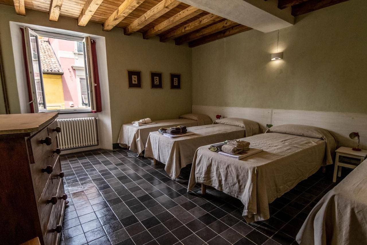 Foto 8 von 10: Quadruple Room with Private Bathroom