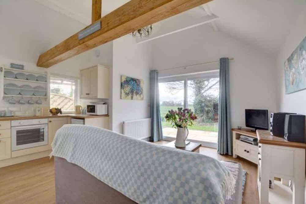 Foto 3 von 24: Herrliche Aussicht von diesem schönen Cottage mit einem Schlafzimmer.