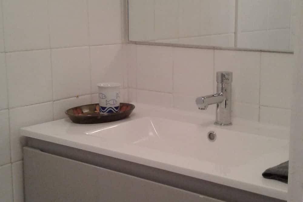 Foto 4 von 11: Appartement au Calme Dans un Parc Ombragé